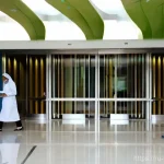 브루나이 의료 서비스 수준 - **Prompt:** A modern, brightly lit hospital lobby in Brunei. The architecture is sleek and contempor...